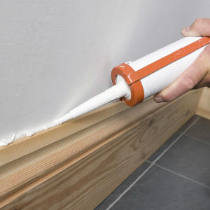 Wall Floor Trim Caulking by Ryno Custom Flooring Inc.