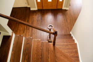 [Seiman - Front Hallway Stairs - Angle #2] Floor Refinishing in Melrose Park, IL by Ryno Custom Flooring Inc.